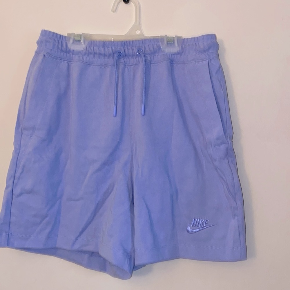 Purple Nike shorts